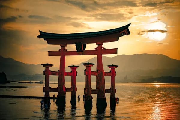 Floating torii gate at sunset in Hiroshima